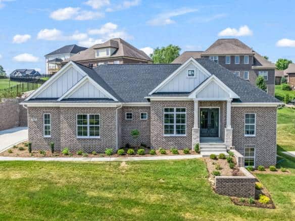 Beautiful new construction home with brick exterior and contemporary design.