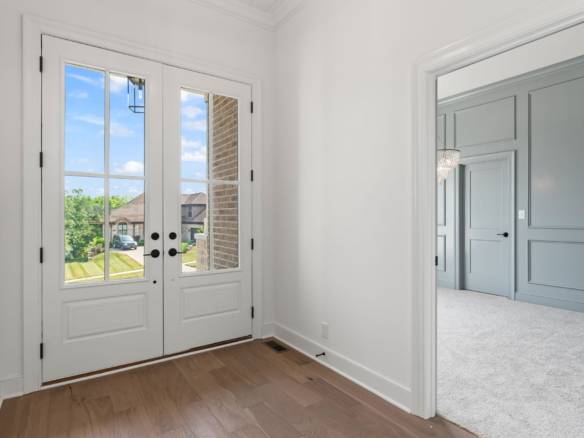 Entry door with glass panels at 5609 Morningside Drive.