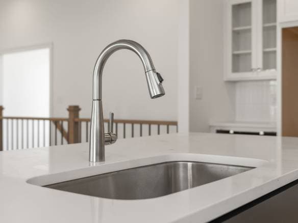 Modern kitchen sink with sleek faucet at 5609 Morningside Drive.