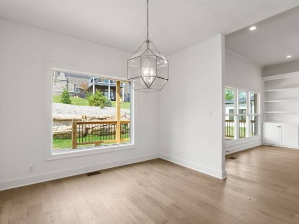 Interior view of a newly renovated living space at 5609 Morningside Drive, showcasing bright, open d.