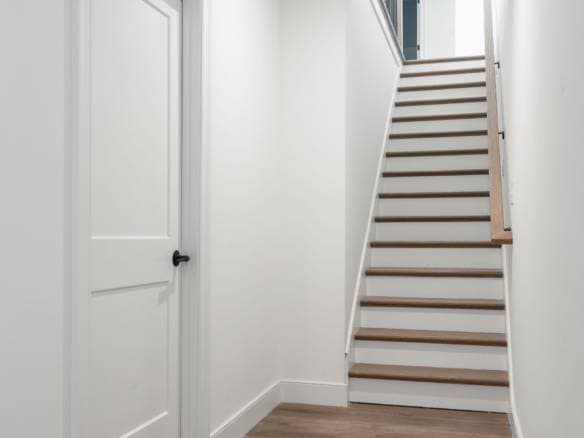 Staircase inside a modern home at 5609 Morningside Drive.
