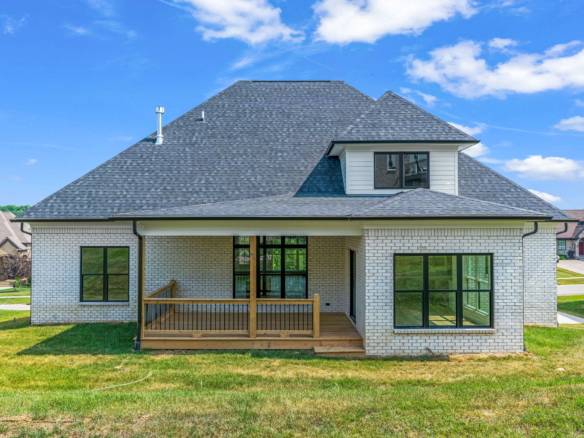 New construction home at 5611 Morningside Drive with a spacious backyard.