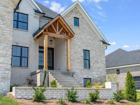 Beautiful stone and brick exterior of a custom-built house on Morningside Drive.