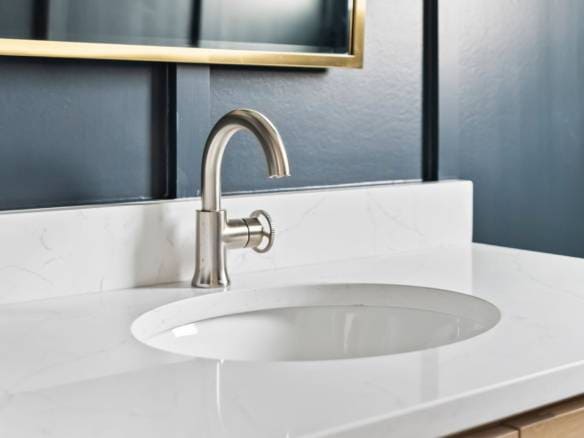 Bathroom sink with modern faucet at 6331 Pond Lily Street.