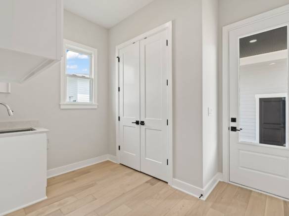 Bright interior with white walls and natural light at 6331 Pond Lily Street.