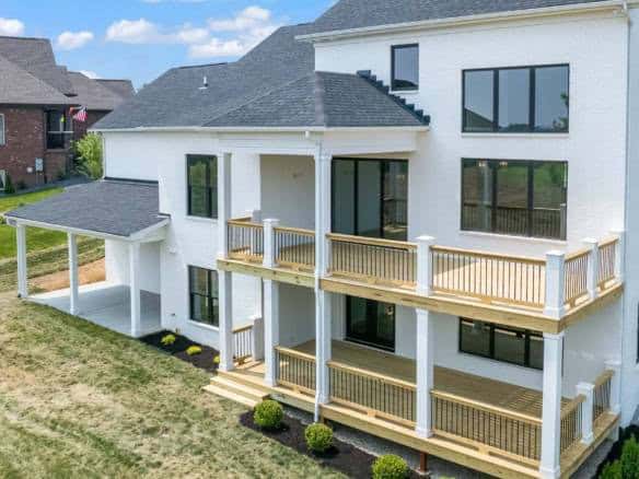 Beautiful new construction home featuring spacious decks and large windows for natural light.
