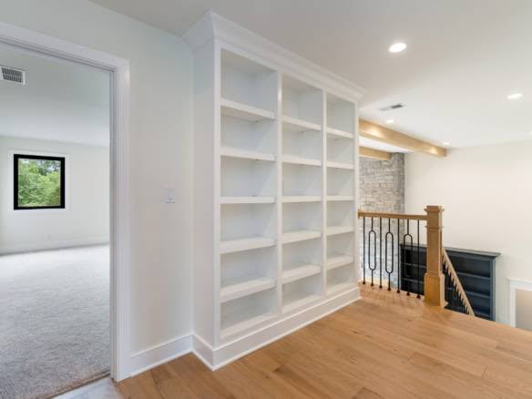 Built-in white shelving unit in a bright, modern home interior at 11105 Craigs Creek Court.