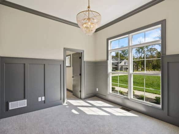 Interior view of a bright, newly renovated room at 6307 Leyton Court with large windows and elegant.