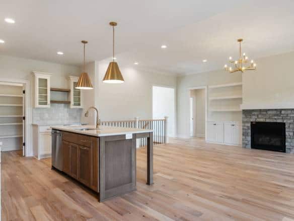 Spacious open-concept kitchen with island and modern finishes in a newly built home. Bright, airy li.