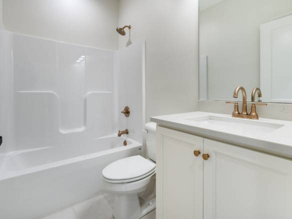 Bathroom renovation with modern fixtures and clean design at 6307 Leyton Court.