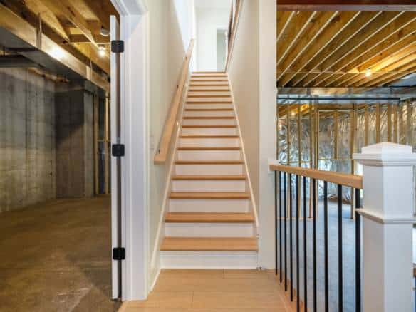 New interior staircase installation at 6307 Leyton Court by Mason Construction.