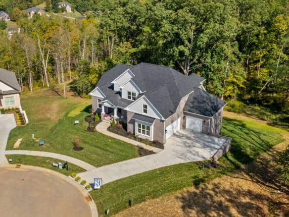 Beautiful aerial view of a newly built house at 6308 Leyton Court showcasing contemporary design and.