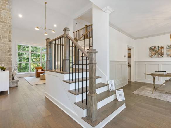 Elegant home interior showcasing open living space and staircase detail at 6308 Leyton Court.