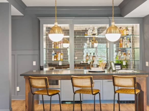 Elegant home bar with modern design and stylish lighting.