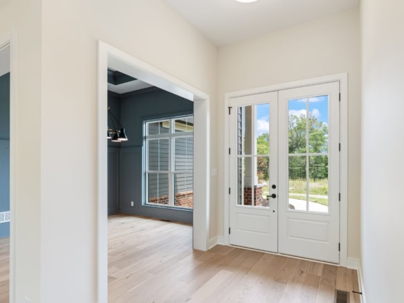 Home interior with bright natural light and white walls at 6209 Brentwood Dr.