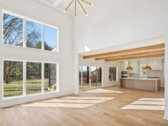 Bright, spacious interior with large windows and natural light.