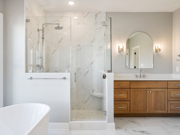 Bathroom with walk-in shower and wooden vanity for a contemporary look.