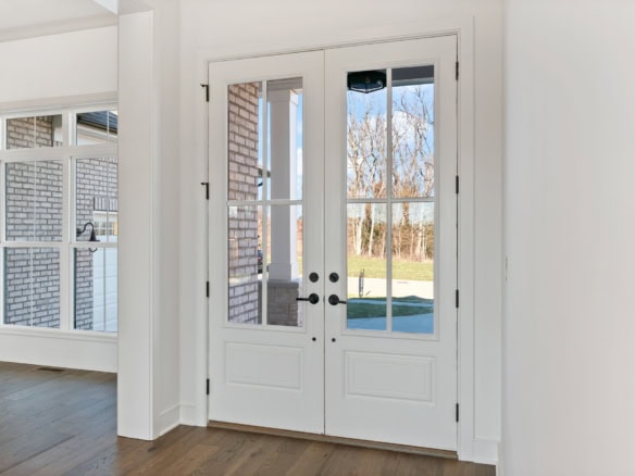 Elegant white double glass doors at 3228 Catalpa Farms Drive.