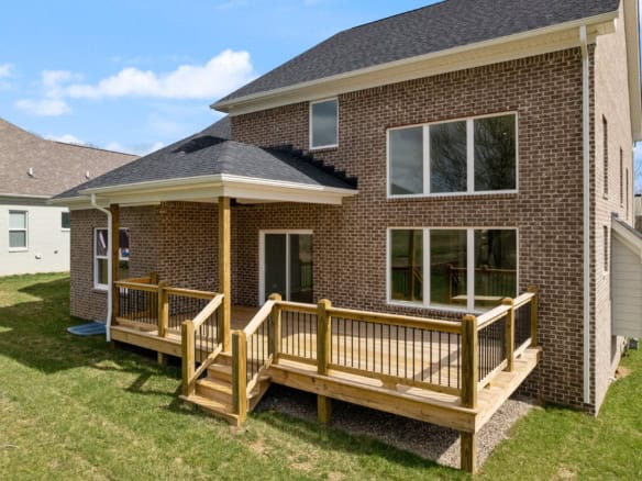 Modern brick house with wooden deck at 3234 Catalpa Farms Dr.
