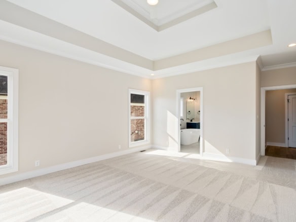 Spacious living room with high ceilings and large windows at 3235 Catalpa Farms Dr.