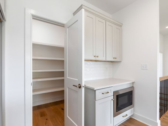 Custom pantry and cabinetry installation at 3236 Catalpa Farms Dr.