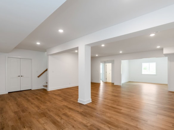 Spacious living area with white walls and hardwood flooring at 3236 Catalpa Farms Dr.