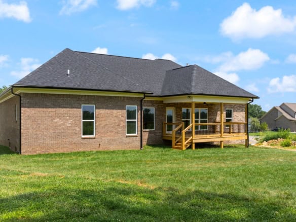 New brick house with front porch at 3236 Catalpa Farms Dr.