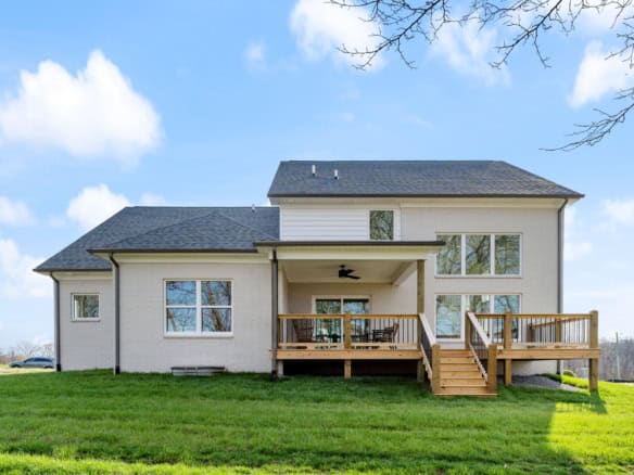 Beautiful two-story house with a spacious deck at 3320 Catalpa Farms Dr.