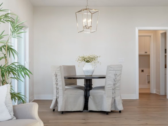 Interior dining area with modern decor and natural light.