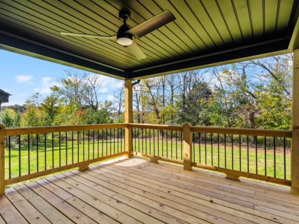 Modern wooden deck with railing at 3322 Catalpa Farms Dr.