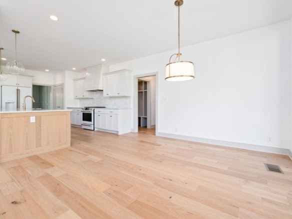 Bright, open-concept kitchen and living space with modern finishes.