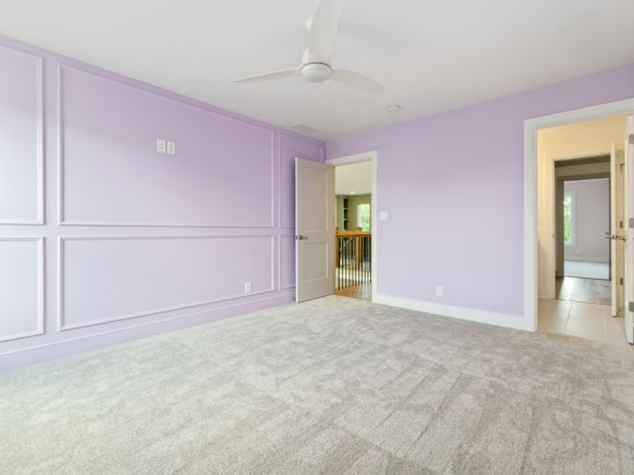 Interior of a renovated room at 6207 Brentwood Dr, showcasing fresh paint and spacious layout.