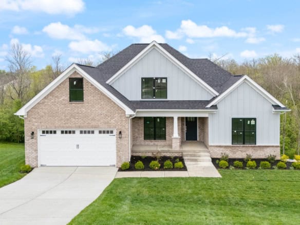A new construction home at 6505 Hypoint Ridge Rd with landscaped front yard.