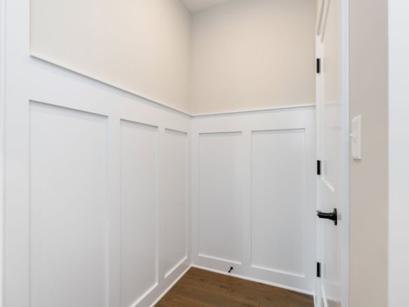 Interior wall paneling and trim at 6603 Oakmont Cir.