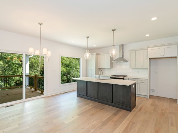 Bright kitchen with white cabinets and natural light.