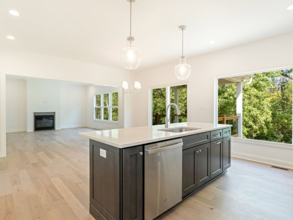 Bright, spacious kitchen with large windows and modern finishes.