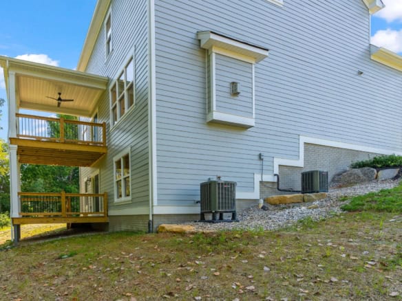 Modern house exterior with decks and siding at 6714 Hypoint Ridge Rd.