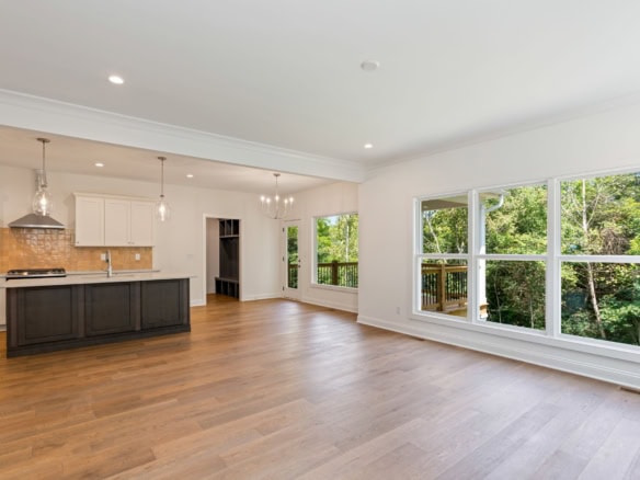 Spacious interior with natural light and scenic views at 6715 Hypoint Ridge Rd.