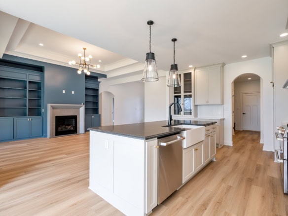 Bright, spacious kitchen with island and modern appliances.