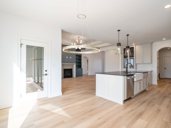 Bright, open-concept kitchen and living area at 7395 Edith Way.